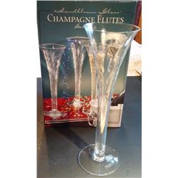 NEW IN BOX 4 HAND BLOWN CHAMPAGNE FLUTES