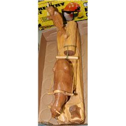 FLAT WITH A HAND CARVED FIGURE OF OXEN PULLING