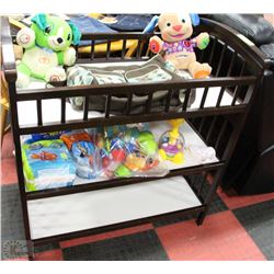 BROWN WOOD CHANGE TABLE W/BABY TOYS,