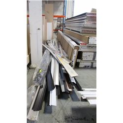 STACK OF ASSORTED GARAGE DOOR SEALS