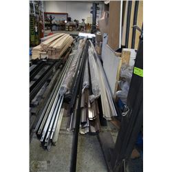 LARGE STACK OF GARAGE DOOR TRIM & METAL SUPPORTS