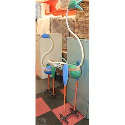 PAIR OF HANDMADE ROCKING METAL & ROCK BIRDS