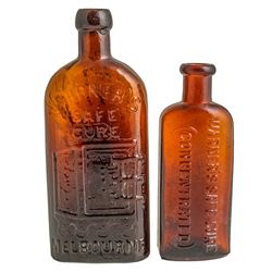 Two Warner’s Safe Cure Bottles