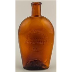 Louis Taussig & Co. Amber Whiskey Flask