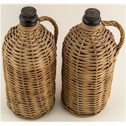 Two Whiskey Bottles in Wicker