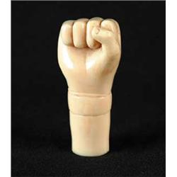 CARVED IVORY CANE HANDLE IN FIST FORM