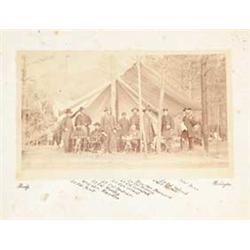 MATTHEW BRADY (American, 19th Century)  ULYSSES S. GRANT AND OFFICERS UNDER TENT