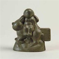 BOY ON LARGE RABBIT PEWTER ICE CREAM MOLD. 