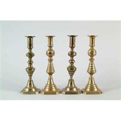 TWO PAIR OF BRASS PUSH UP CANDLESTICKS