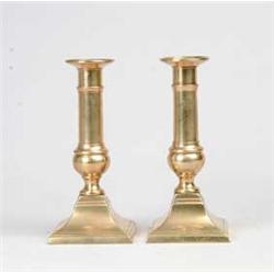 PAIR OF PUSH UP BRASS CANDLESTICKS