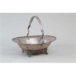 OUTSTANDING ENGLISH SILVER HANDLED FOOTED BASKET