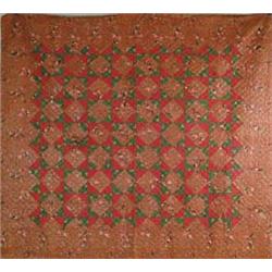 FINE ANTIQUE CHINTZ AND PATCHWORK QUILT