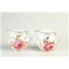 Image 1 : RARE PAIR OF FLOWER DECORATED PORCELAIN PITCHERS