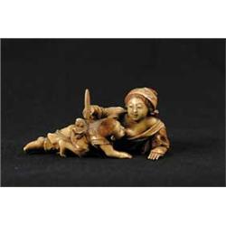OUTSTANDING ORIENTAL CARVED IVORY OF A WOMAN AND CHILD WITH FAN