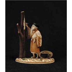 CARVED IVORY THREE PART FIGURE OF AN ARTIST NEXT TO TREE