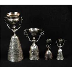 FOUR STERLING MARRIAGE CUPS
