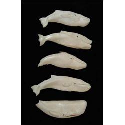 FIVE CARVED WHALE BONE WHALES