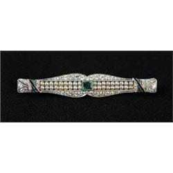 FINE PLATINUM, EMERALD, DIAMOND, PEARL AND BLACK ONYX BROOCH