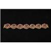 Image 1 : HEAVY 18KT GOLD RUBY AND SAPPHIRE BRACELET. 
