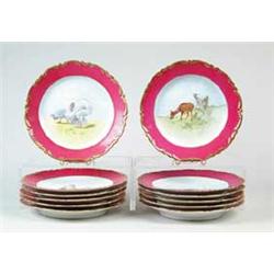 SET OF TWELVE DECORATED FISH AND GAME PLATES