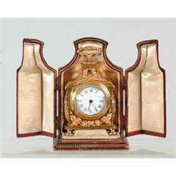 LEATHER CASED MINIATURE BRACKET CLOCK