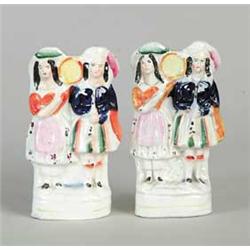 PAIR OF STAFFORDSHIRE FIGURINES OF A MAN AND WOMAN