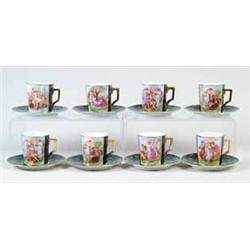 SET OF NINE DECORATED CUPS AND SAUCERS BY VICTORIA, AUSTRIA