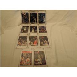 11 NBA BASKETBALL CARDS IN CASES AS SHOWN