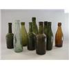 NINE GLASS ADVERTISING BOTTLES, 19th century and later, including Ind Coope, Jackson, Marston, Al...