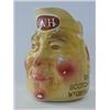 Image 1 : A GREEN & CO ADVERTISING FACE JUG, 'O.V.H Scotch Whisky', maker Associated Potteries Co, height 1...