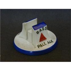 A BASS ADVERTISING MATCH STAND, 'Imperial Stout' and 'Pale Ale', glazed bisque ceramic, diameter...