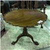 Image 2 : EARLY 1900'S REPRODUCTION CHIPPENDALE TILT- TOP MAHOGANY CLAW FOOT TABLE