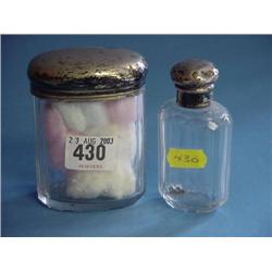 2 Silver Topped Jars...