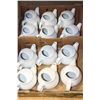 Image 1 : TWELVE TEAPOTS