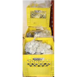FOUR MILK CRATES OF PEGS