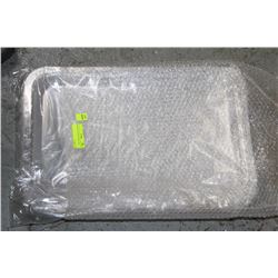 STACK OF CLEAR PLASTIC LIDS