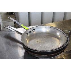 THREE LARGE FRYING PANS
