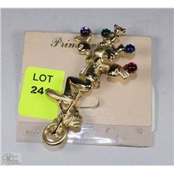 BEJEWELLED CLOWN ON UNICYCLE BROOCH