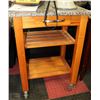 Image 1 : PINE CHOPBLOCK ISLAND WITH GRANITE TOP ON WHEELS