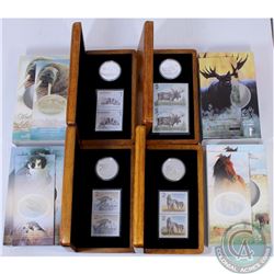 Group lot of 4 x Coin and Stamp Sets. You will receive: 2004 Majestic Moose, 2005 Walrus and Calf, 2