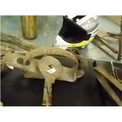 VINTAGE ANIMAL LEG TRAP CHAINED TO LOG