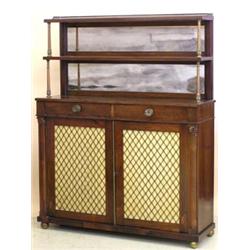 REGENCY BRASS MOUNTED ROSEWOOD SIDE CABINET, English. First half of the 19th Century. The shelv...