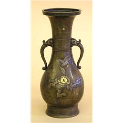 INLAID BRONZE VASE, Japanese. Meiji Period. Late 19th Century. With raised floral and bird desi...