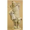 Image 1 : CARVED IVORY FIGURE OF A PEDDLER, Japanese. Signed. Carrying his wares on a bamboo pole and in...