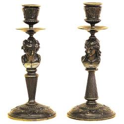 FINE PAIR OF LOUIS XVI STYLE PATINATED BRONZE CANDLESTICKS, French. 19th Century. Each leaf and...