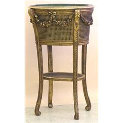 GOOD EMPIRE STYLE CARVED, GILTWOOD AND CANE JARDINIERE, French. The oval bowl fitted with a met...