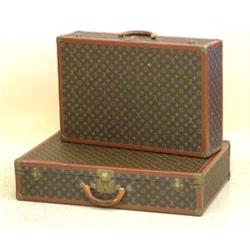 TWO LOUIS VUITTON HARD SIDED SUITCASES, French. Measuring 20 3/4" by 32" and 18 1/2" by 27 3/4"...
