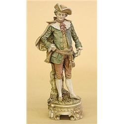 ROYAL DUX PORCELAIN FIGURE OF A CAVLIER, Bohemian. 20th Century. Dressed as an 18th Century Fre...