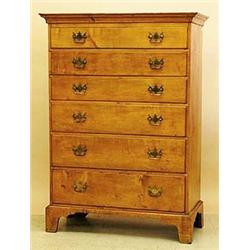 CHIPPENDALE MAPLE TALL CHEST OF DRAWERS, American. New England. 18th Century. The molded cornic...