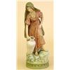 Image 1 : ROYAL DUX PORCELAIN FIGURE, Bohemian. 20th Century. Of an Egyptian female standing on rockery h...